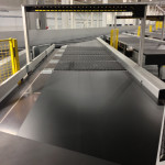 Crossbelt sorter induction point